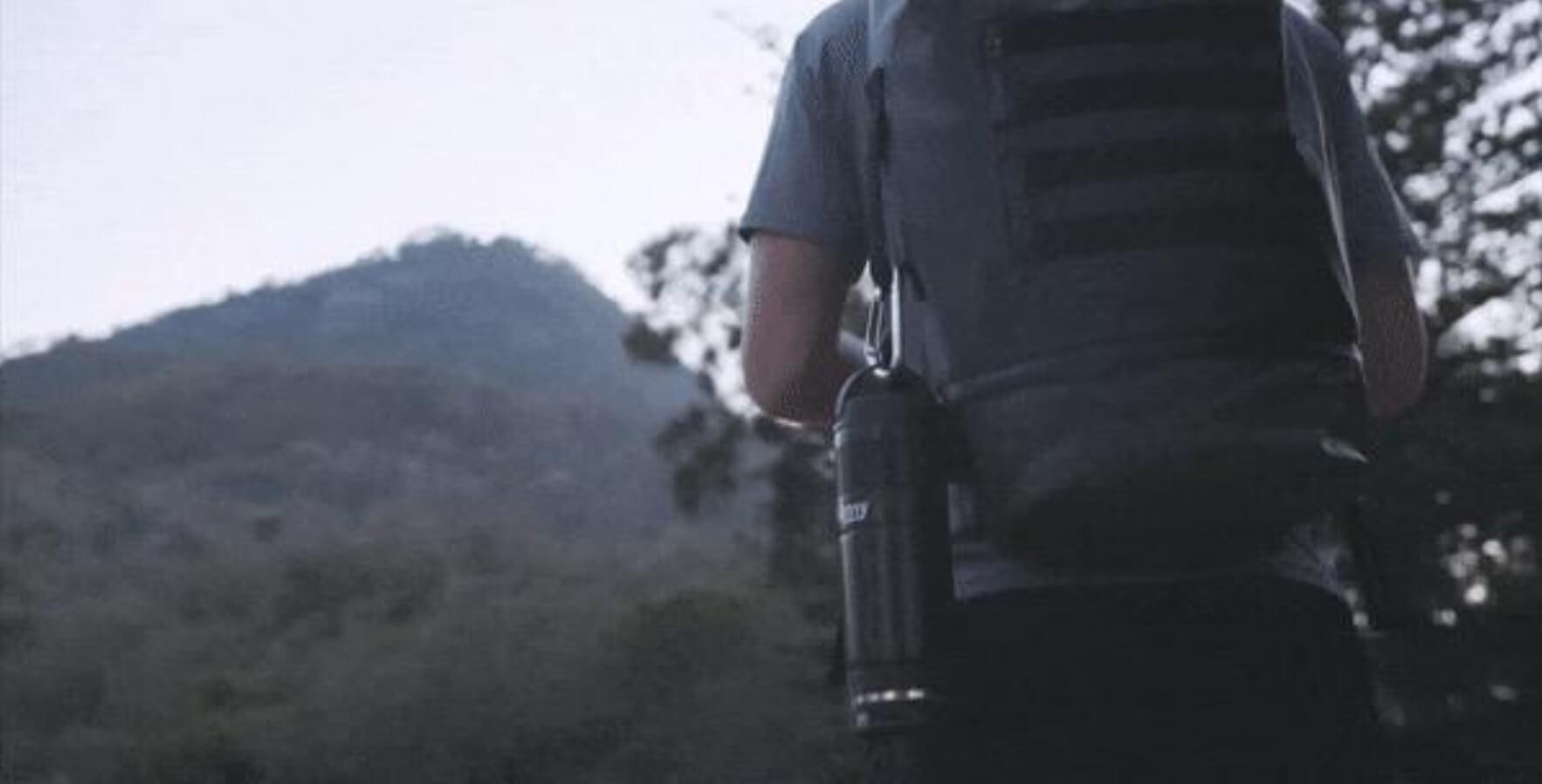 Thermy Bottle carried outside a backpack in the forest